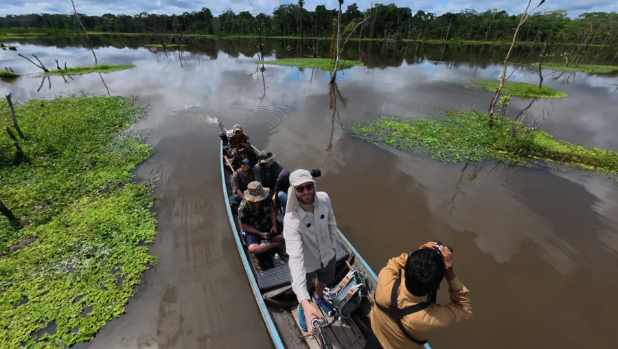 Boat on a flooded river in the Peruvian Amazon